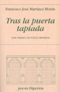 TRAS LA PUERTA TAPIADA